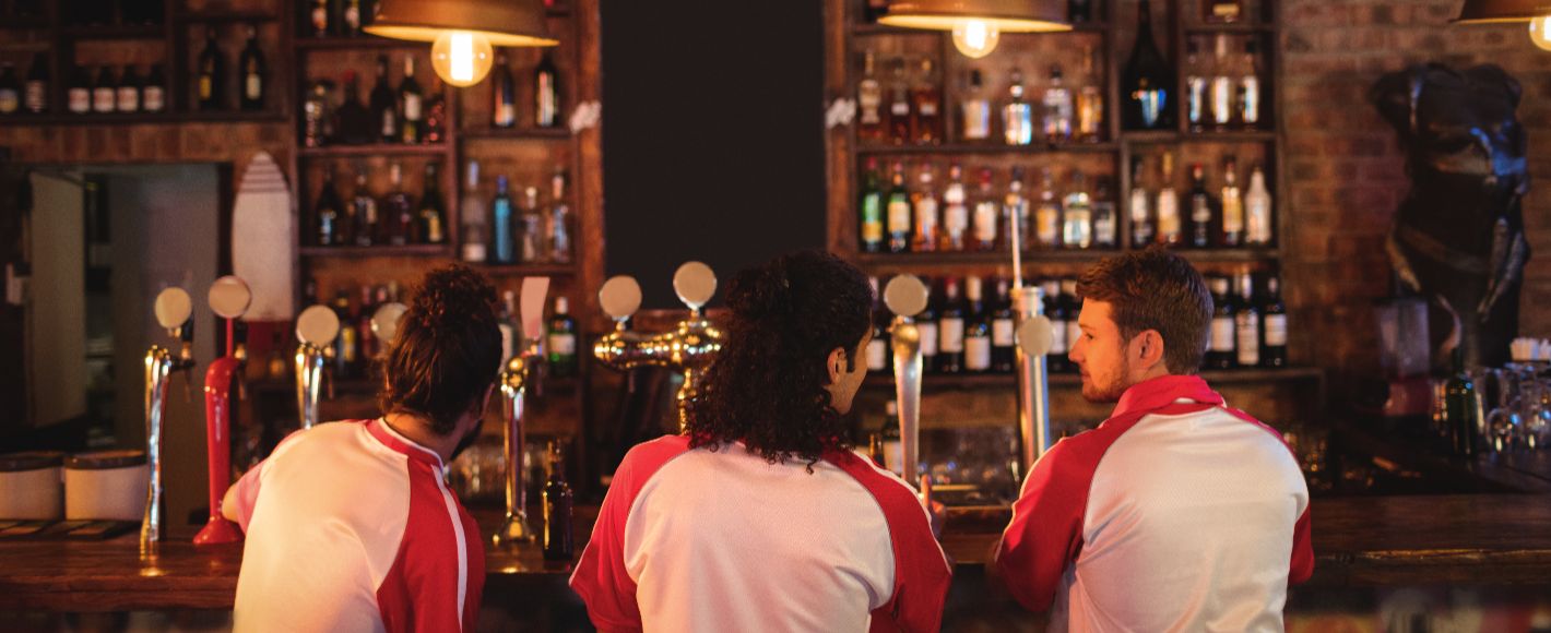 sports team at a bar in a pub