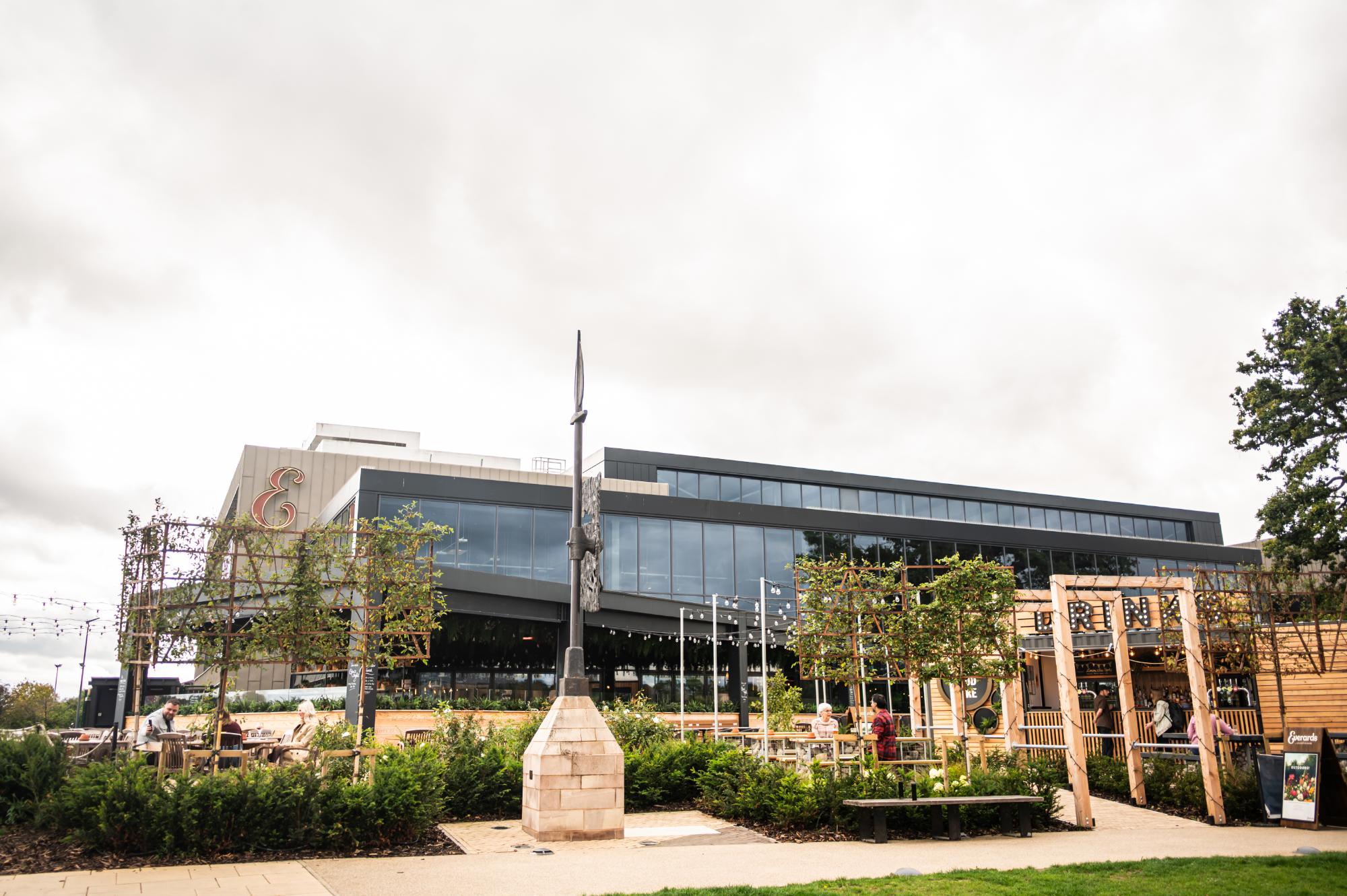 the outside of everards brewery beer hall and beer garden including the enderby shield